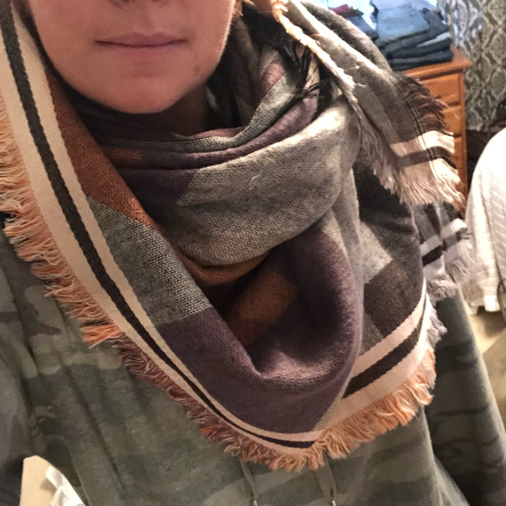 BP PLAID SCARF. Measures 55in by 55in